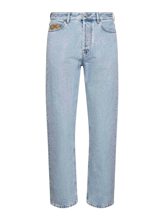 Jeans in denim délavé azzurro con inserto GG