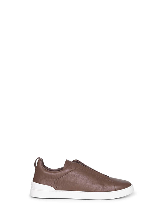 Sneakers Triple Stitch in pelle di cervo marrone
