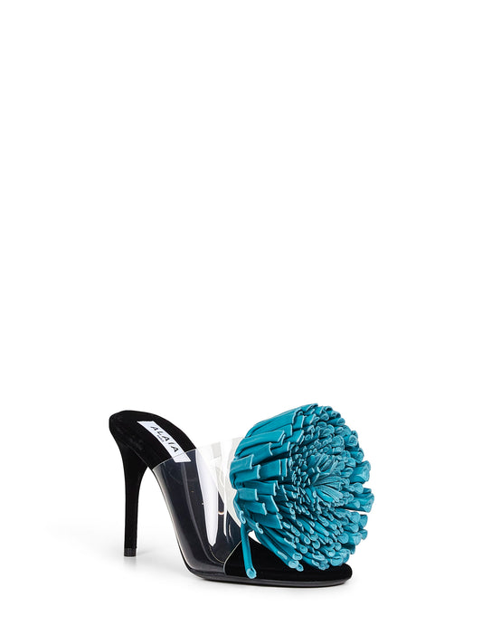 Asymmetric sandals with large 3-D leather flower