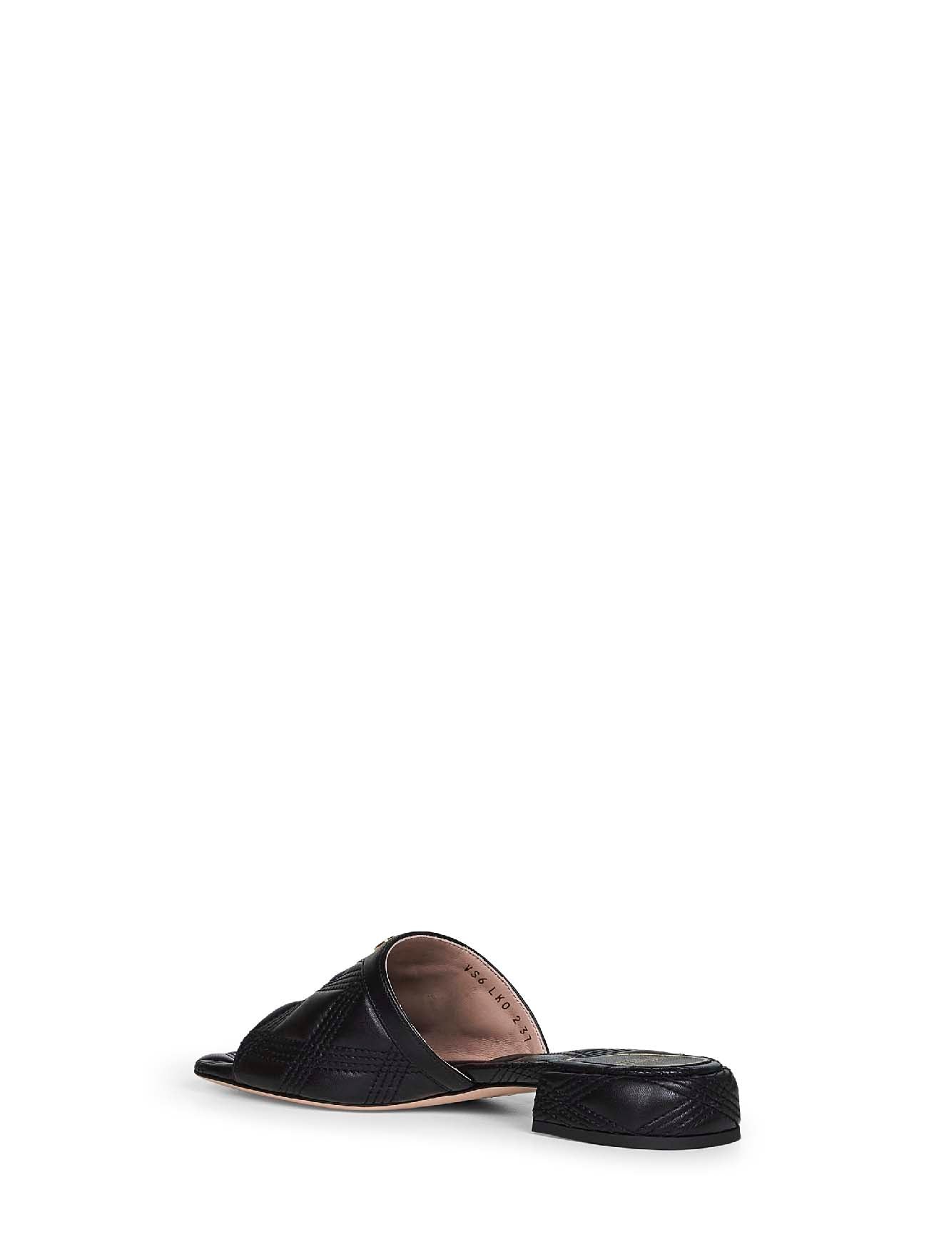 Black quilted nappa leather Quiltie 67 slide sandals