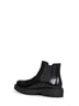 Black calfskin Chelsea boots by Prada