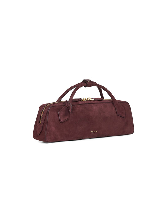 Alaìa Burgundy Le Teckel clutch bag
