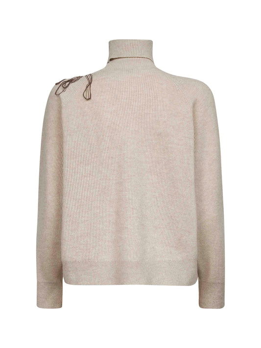 Maglia dolcevita in cashmere beige con ricamo