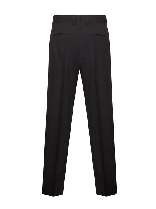 Black wool gabardine cigarette trousers