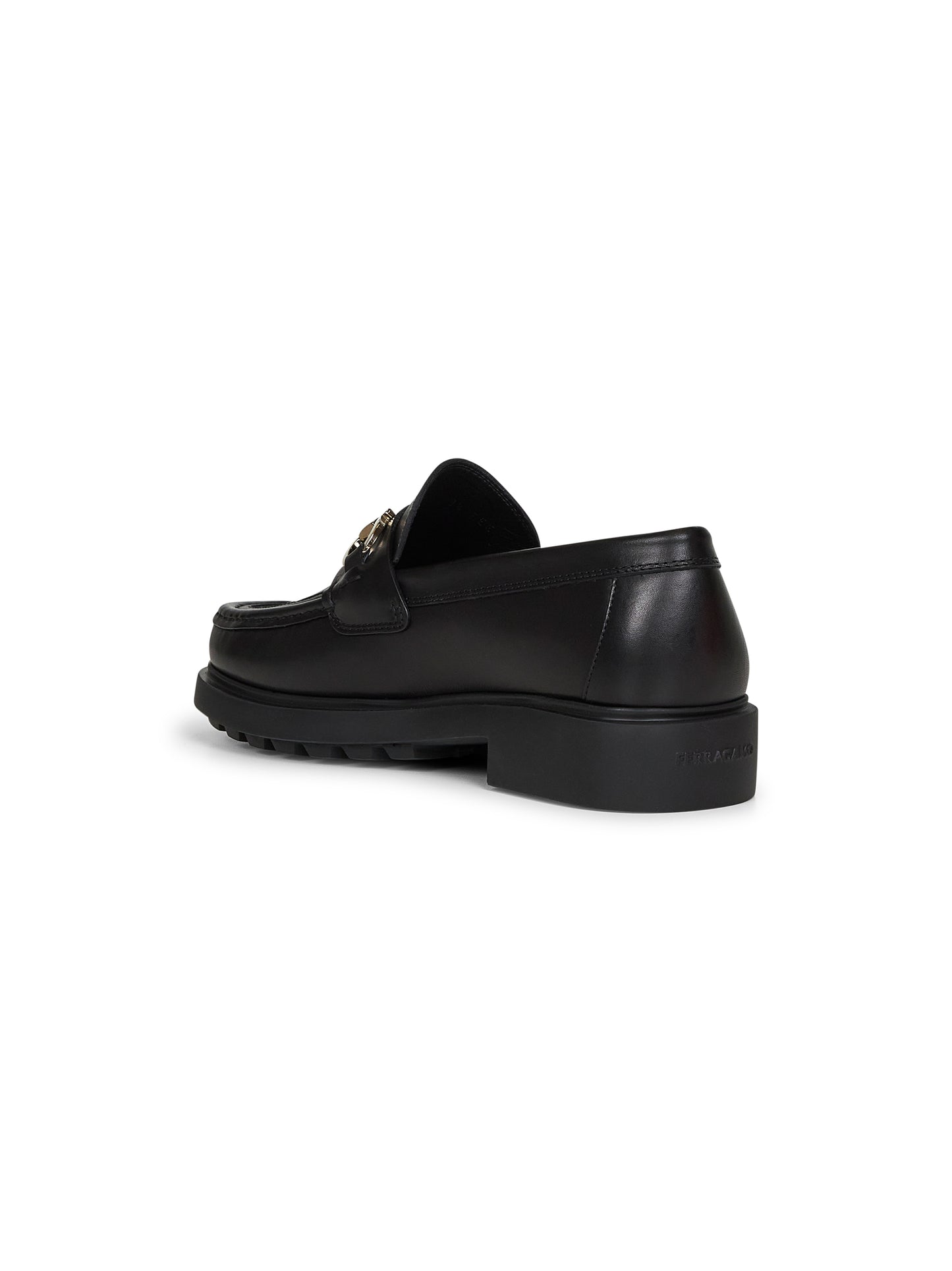 Mocassin in pelle nera con ornamento Gancini