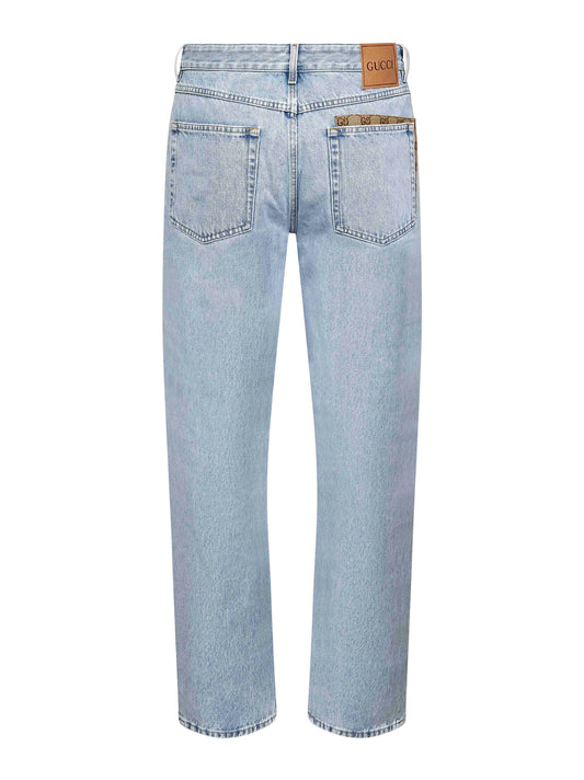 Jeans in denim délavé azzurro con inserto GG