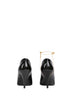 Black patent leather heeled Gucci 97 pumps