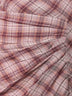 Abito asimmetrico Naerys in cotone a quadri rosa
