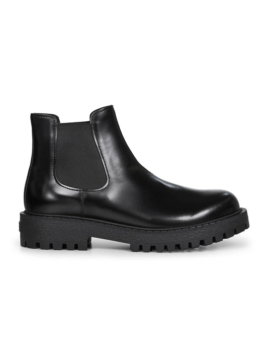 Black calfskin Chelsea boots by Prada