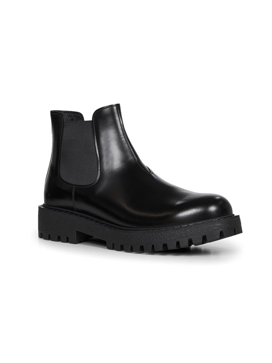 Black calfskin Chelsea boots by Prada