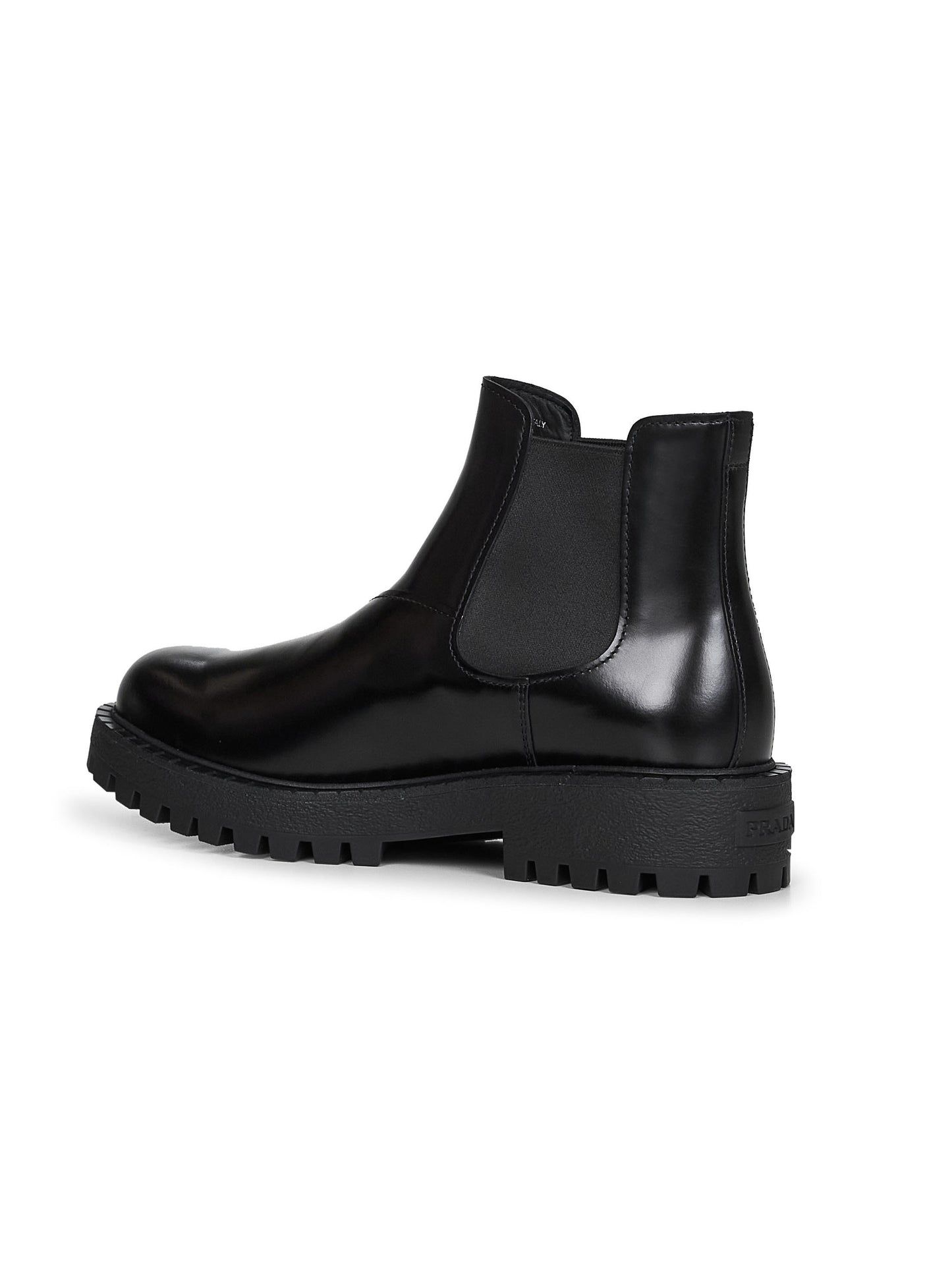 Black calfskin Chelsea boots by Prada