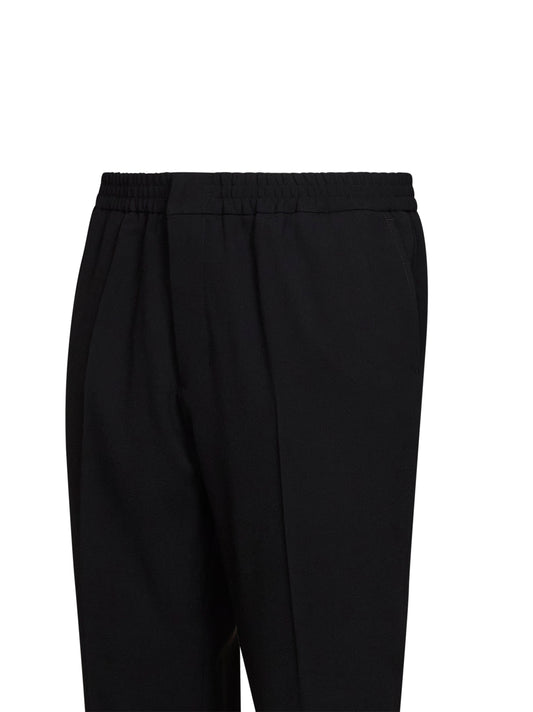 Pantaloni in serge di lana nero con vita elasticizzata