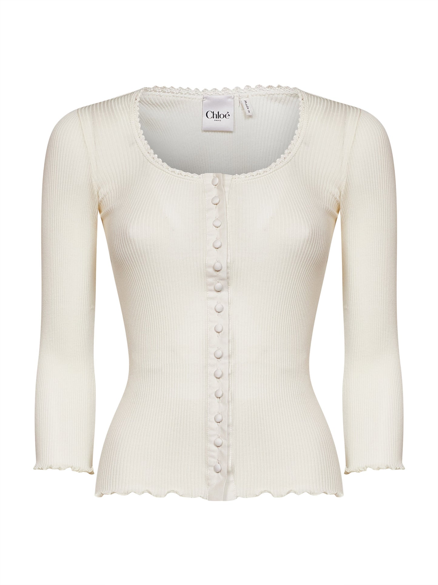 Top aderente in jersey a costine latte