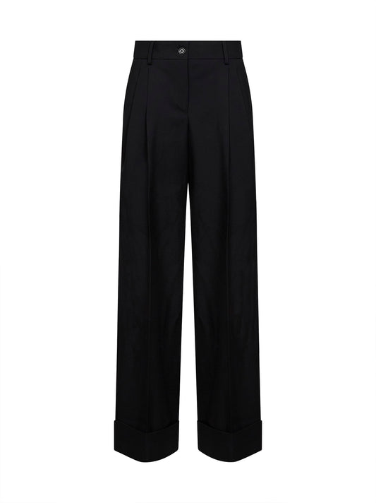 Black virgin wool trousers with turn-up hems