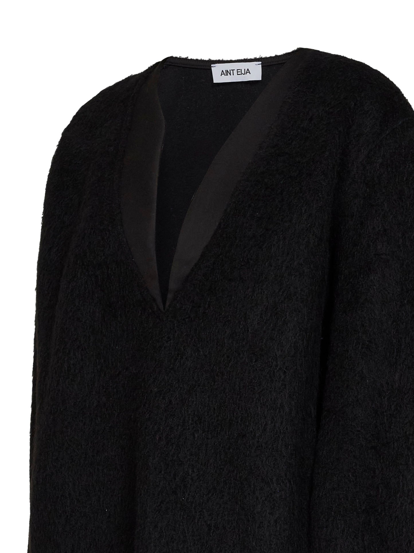 Black fleece sweater with asymmetric neckline