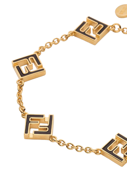 Gold metal and black enamel Fendi Forever bracelet