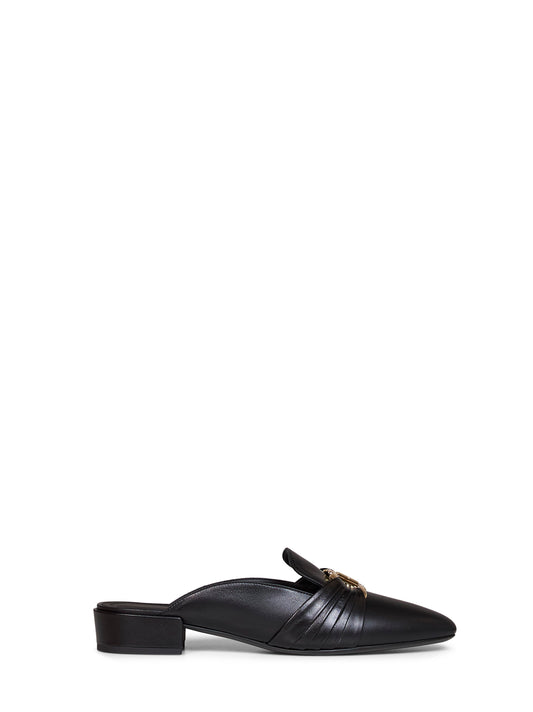 Mules Corby nere con ornamento Gancini