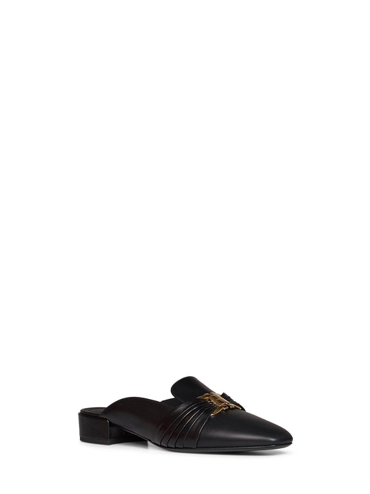 Mules Corby nere con ornamento Gancini