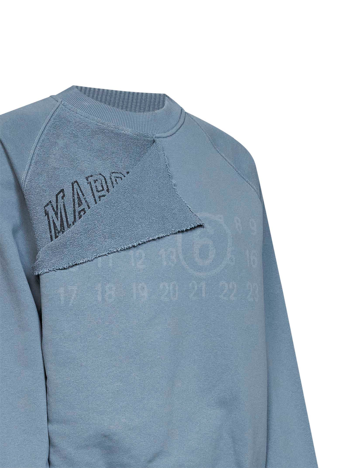 Light blue cotton sweatshirt with signature and layered panel