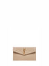 UPTOWN clutch in grain de poudre embossed leather