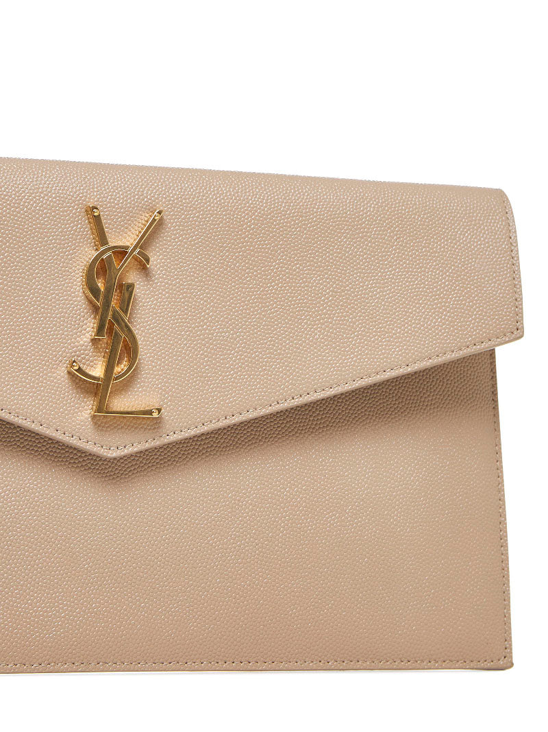 UPTOWN clutch in grain de poudre embossed leather