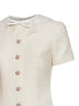 Miniabito sartoriale in bouclé crema con inserti in pizzo