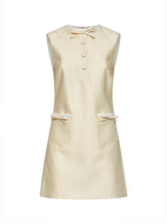 Yellow taffeta mini dress with bows detail