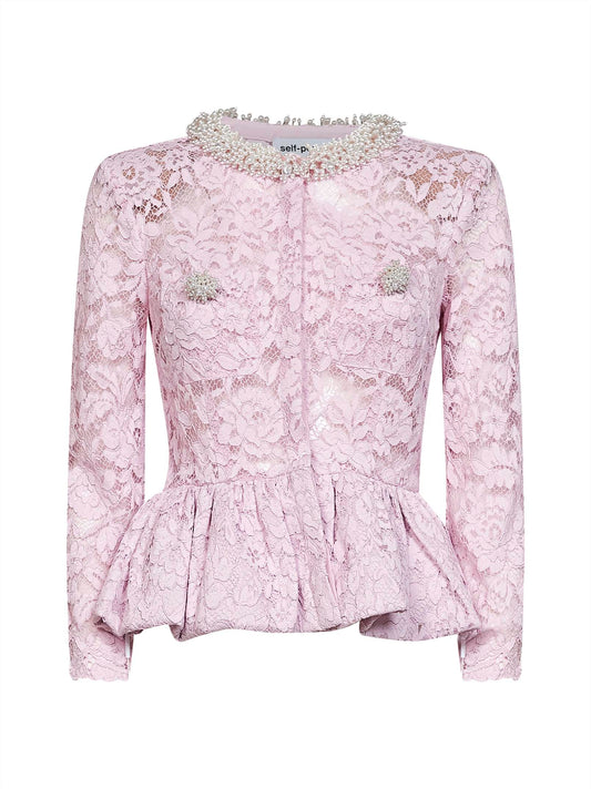 Pink lace top with peplum hem