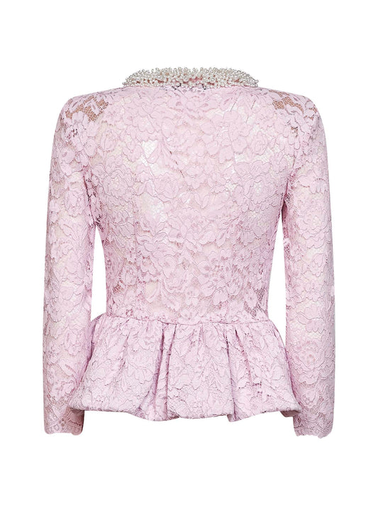 Pink lace top with peplum hem