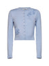 Cardigan in maglia blu con dettaglio fiori