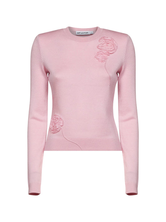 Pink knit jumper with flowers detail
