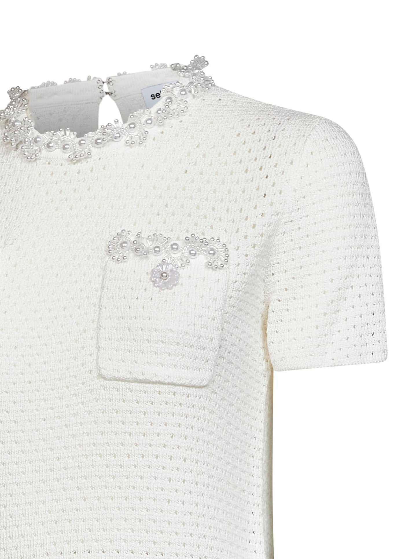 Cream openwork knit top with bead embroidery