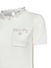 Cream openwork knit top with bead embroidery