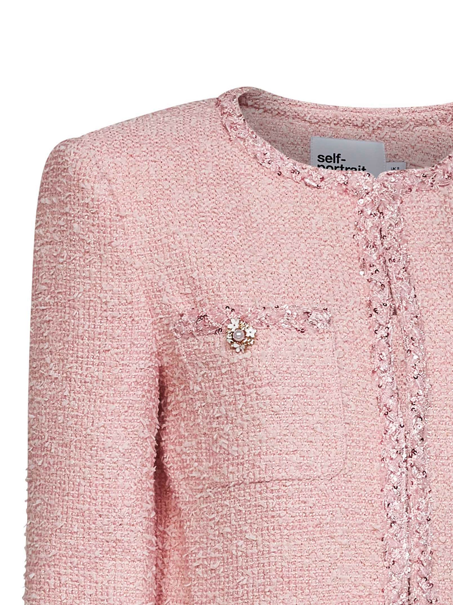 Pink bouclé jacket with braided trimmings