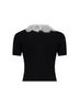Top in maglia di lana nera colletto in pizzo