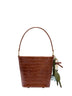 Brown bucket bag with charms
