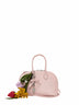 Pink mini bag with shoulder strap and charms