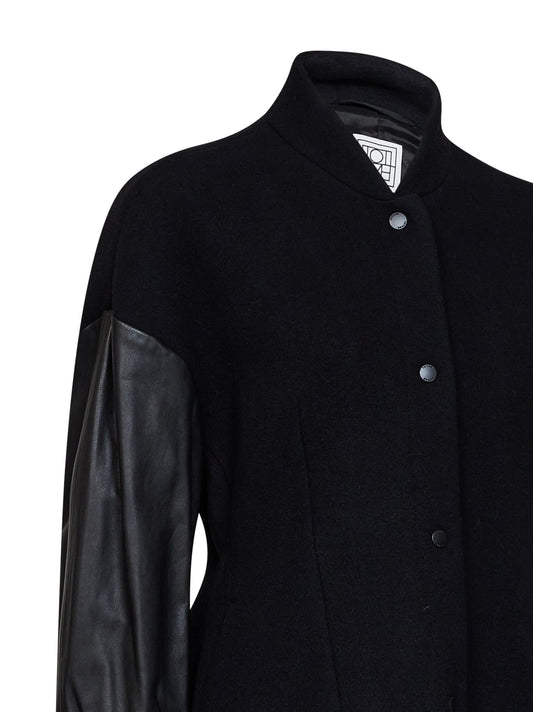 Black wool-blend varsity jacket with leather sleeves