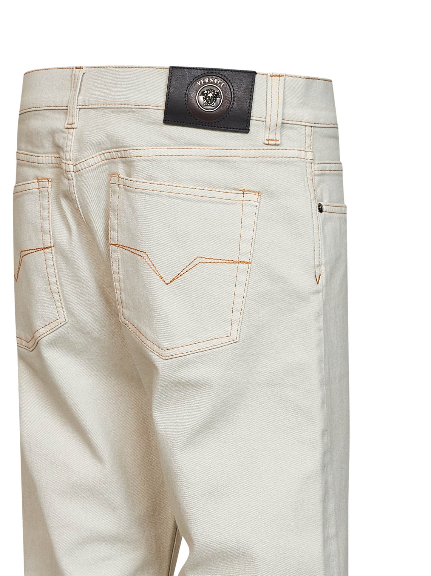 Jeans affusolati in denim di cotone stretch avorio