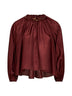 Blusa arricciata con perline Aster in habotai di seta merlot