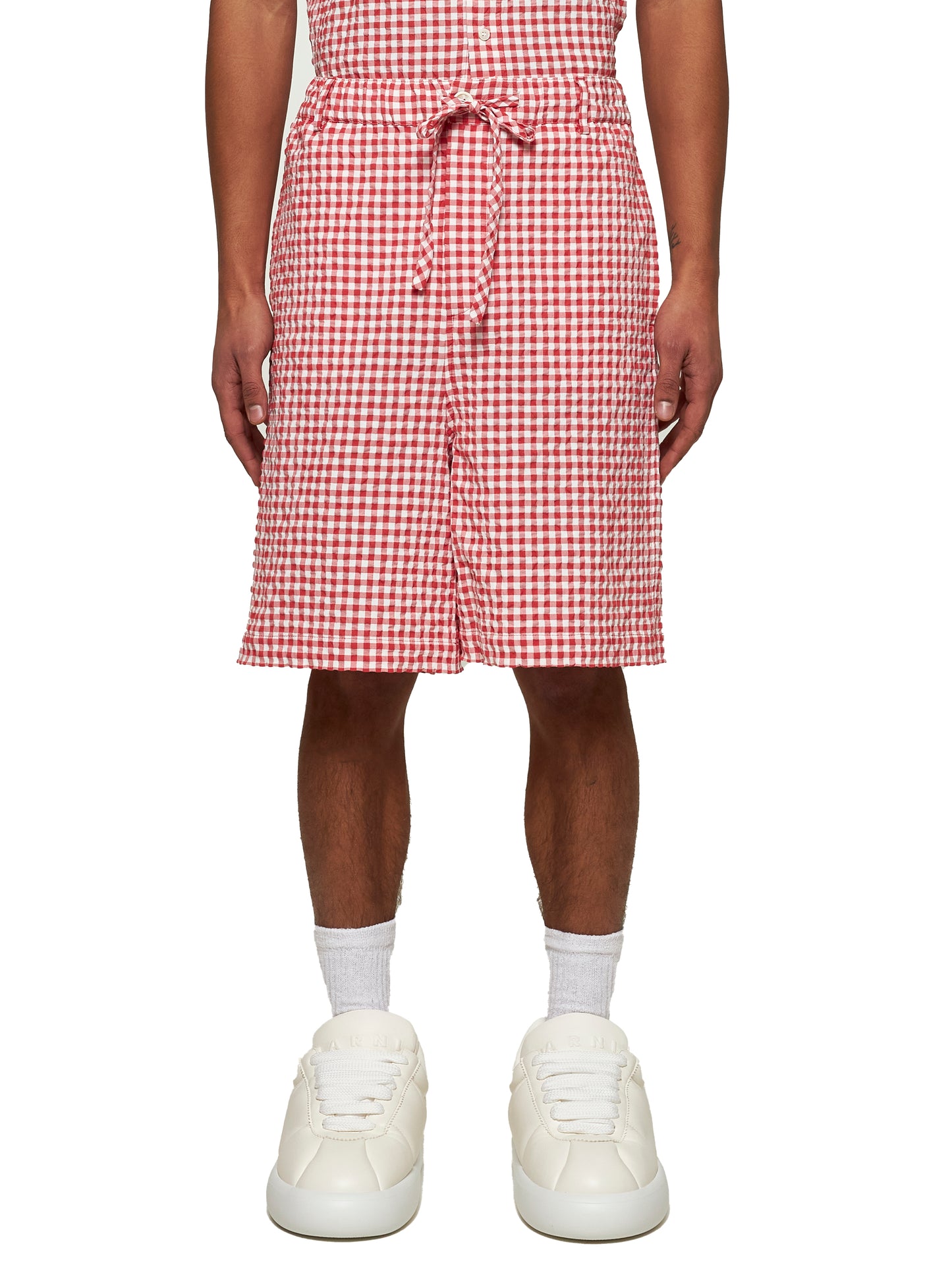 Pantaloncini a quadretti rossi e bianchi