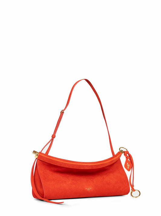 Orange brule "Le Click East West" shoulder bag