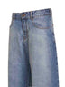 Faded blue washed raw denim low-rise round jeans