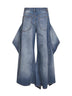 Jeans con ruche in denim grezzo délavé blu sbiadito