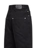 Jeans a gamba ampia in denim nero sbiadito