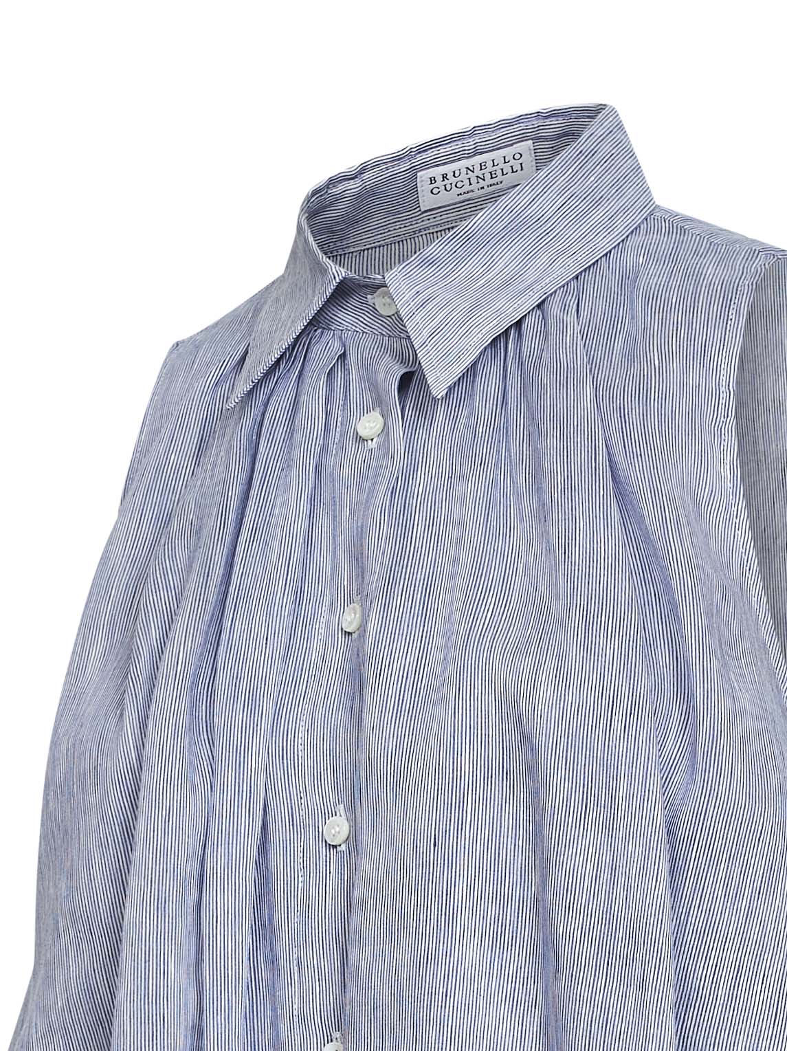 Camicia smanicata in organza a righe bianco e blu