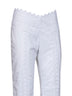 Pantaloni svasati Vianora in pizzo floreale e voile bianco
