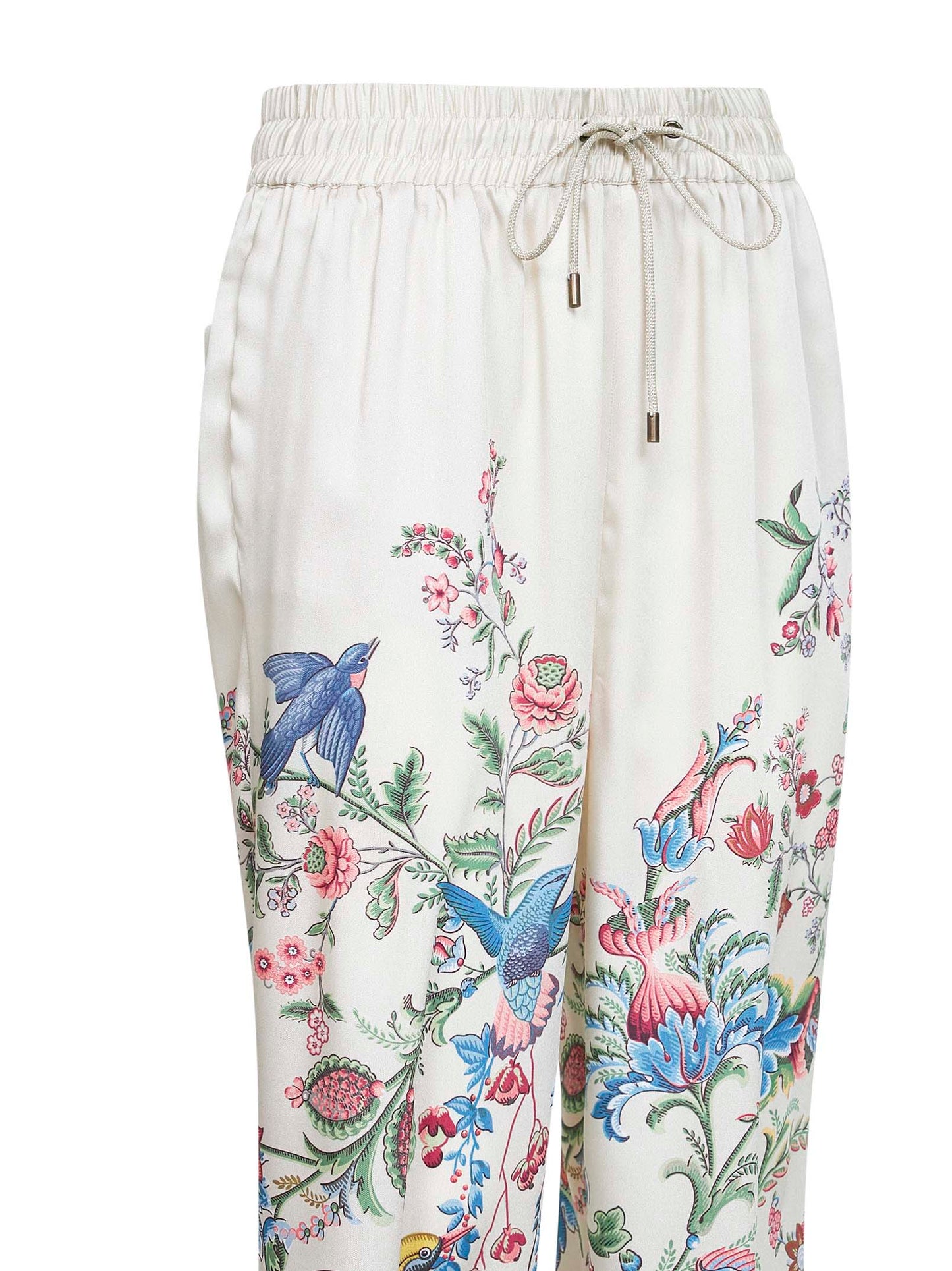 Pantaloni ampi in twill bianco con stampa flora e fauna