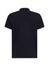 Polo in piquet di cotone blu con patch logato