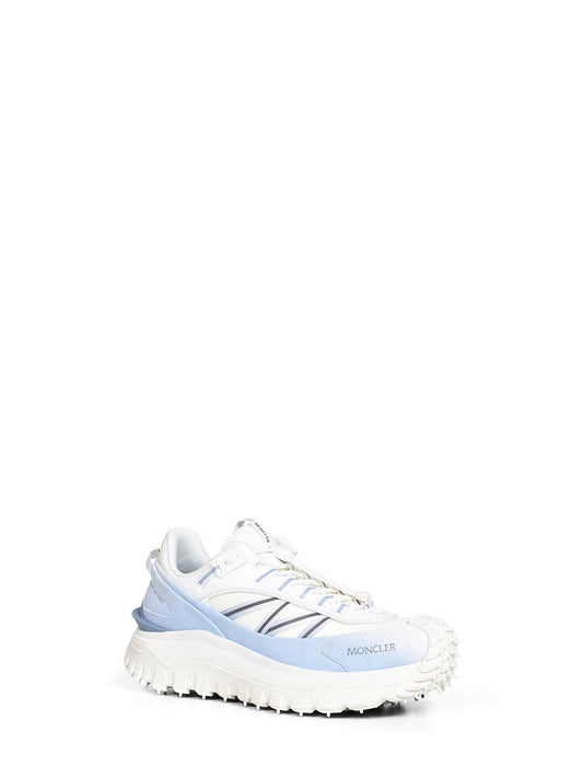 White and blue Trailgrip sneakers